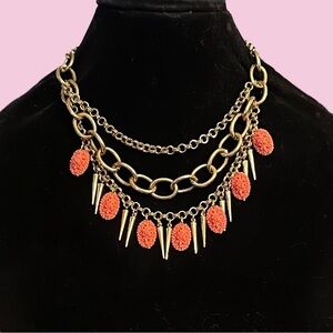 Yochi NY multi layered coral cabochon and spikes charm necklace